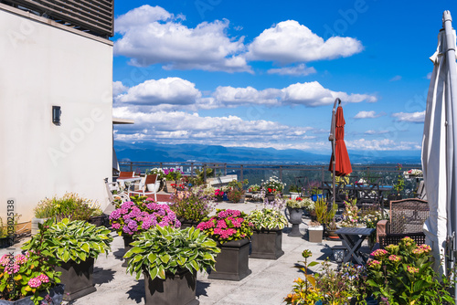 Photos Floral abundance on BC rooftop patio garden with extensive view over Fraser Valley