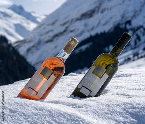 Ros and White Wine Bottle Mockup in Snowy Mountain Landscape