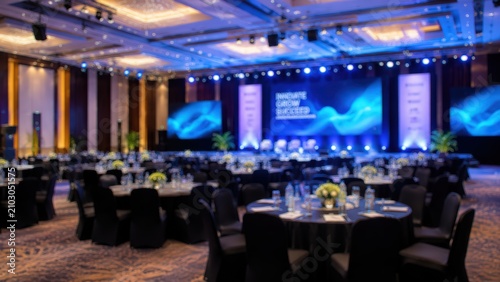 Conference banquet hall gala dinner business event blurred background luxury ballroom seminar venue staging lighting