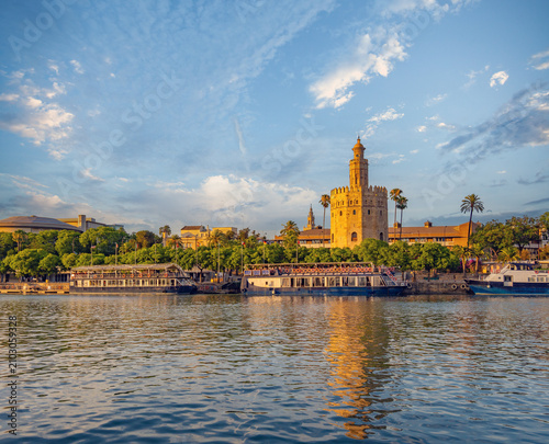 Reflection of the famous Torre del Oro tower on the waters of the Guadalquivir river, Seville, Andalusia, Spain
