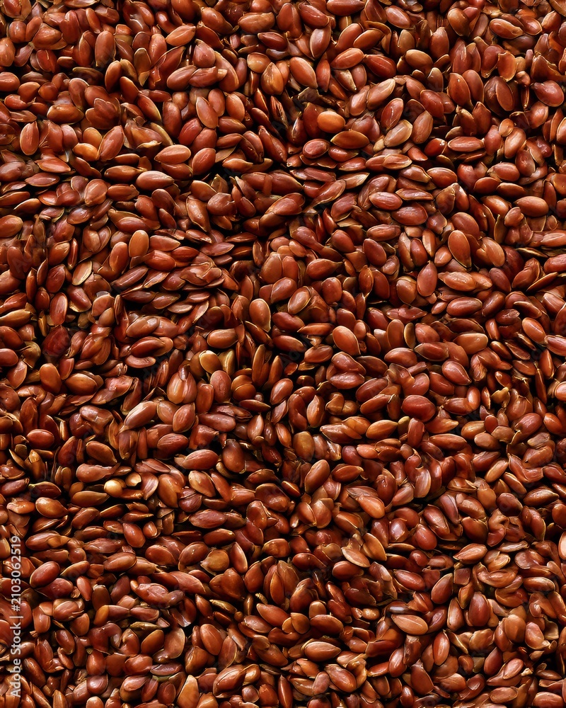 Obraz premium Flax seeds scattered on a surface in a kitchen setting during daylight hours