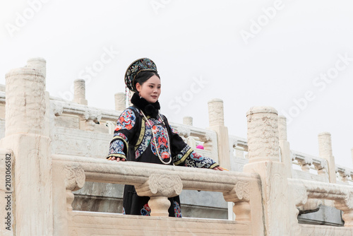 Woman in Traditional Chinese dress at Beijing palace