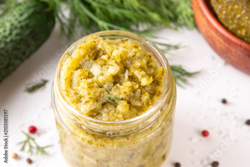 Картината върху платно Homemade Dill Pickle Relish, tasty cucumber pickle relish condiment, with fresh