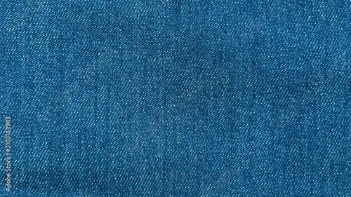 Blue jean texture. Blank denim cloth textile background. Soft fabric. Flat cotton surface. Grunge structure design. Dark navy material. Indigo vintage style. Copyspace