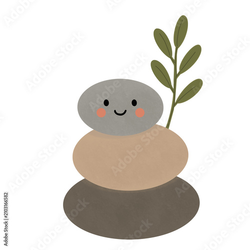 Photography Cute stacked zen balance stones with a smiling face and green botanical leaf