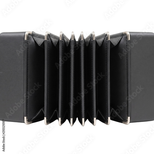 Foto Close up of black leather concertina bellows with metal corners