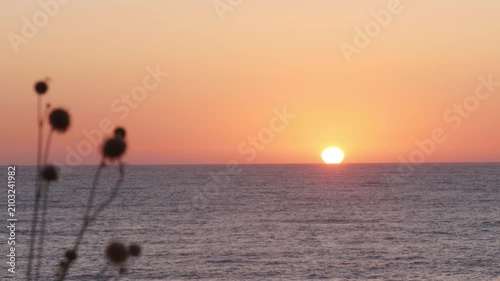 Beautiful Red Sunset on the Sea. Summer Tropical Sunset Sea View. Beautiful Seascape, Red Dusk on the Ocean.
