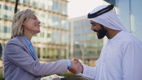 Group of multiethnic business people meeting an emirati businessman