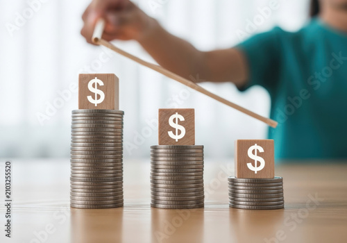 Increasing stack of coins with dollar sign cubes symbolizing financial growth and investment success investment planning wealth accumulation income growth.