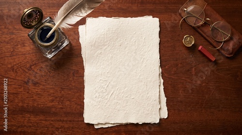 Quadro su tela Blank Vintage Parchment Paper Mockup on Dark Wooden Table Top View with Quill Pe