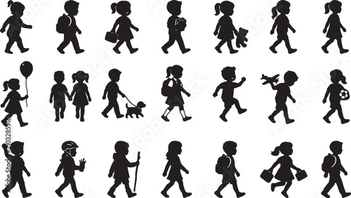 Set of black silhouettes of happy children walking and playing in different ways