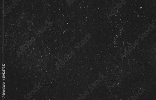 Fotografía Black grunge texture overlay background with vintage film scratch effects, dust particles, and grain for graphic design