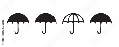 Photos Set of four solid and outline umbrella icons for weather protection and rainy day concepts