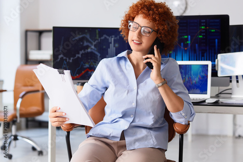 Smiling businesswoman with ...
