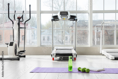 Modern gym interior with ex...
