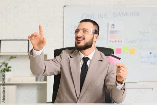 Young businessman in AR gla...