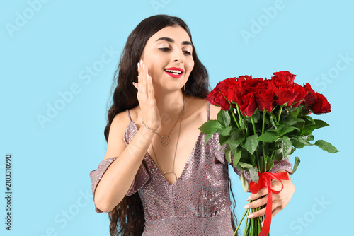 Surprised young woman with ...