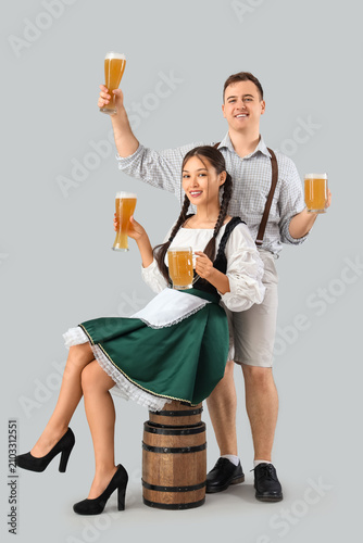 Young happy couple in tradi...