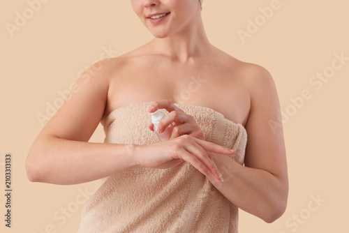 Young woman in towel after ...