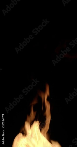 A burst of fire erupts from below, sending flames upward in a powerful explosion of energy.