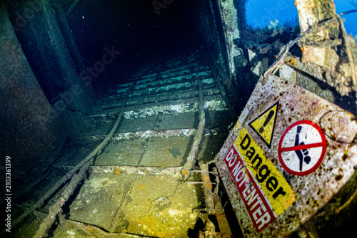 Konstfotografi Underwater danger sign on the sunken shipwreck in MV XLENDI on Gozo, Malta