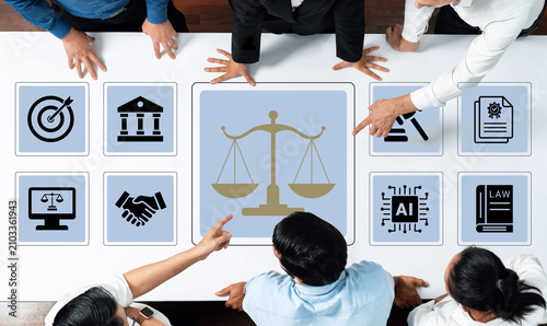 Quadro su tela Diverse professionals collaborate on legal technology concepts, discussing ideas related to law, justice, and AI integration in a modern business environment