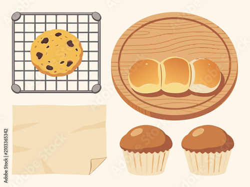 Set of freshly baked goods on cooling rack and wooden tray with homemade