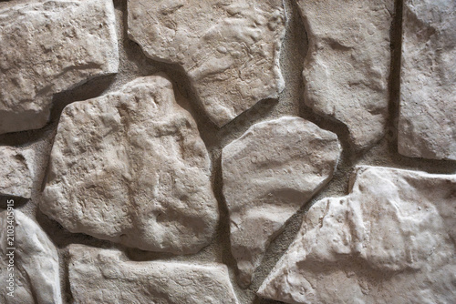 Photography Close-Up of Cream Fieldstone Wall Texture with Irregular Natural Stone Pattern