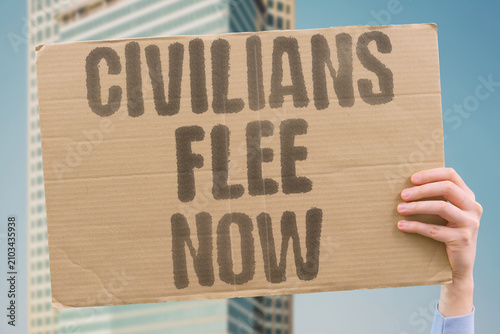 Fotografía "Civilians Flee Now" People are evacuating