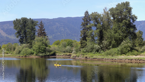 Peaceful moment paddling on calm river