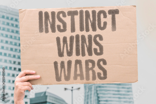 Photos "Instinct Wins Wars" One concise descriptive sentence