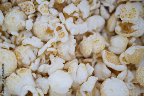 Popped popcorn close-up, showcasing airy texture and slight toasting