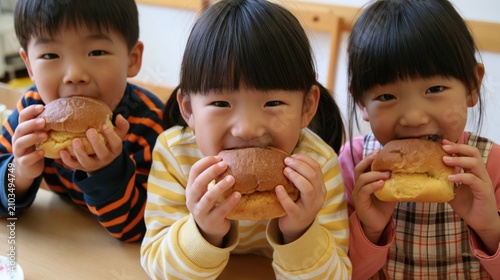 Joyful Children Savoring Colorful Japanese Snacks: Playful Indoor Bonding Over Cute Pastries and Bread Rolls With Friends