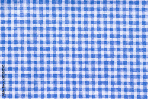 Bright blue gingham fabric, flat lay