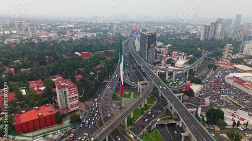 Sweeping aerial landscape of San Jerónimo with Monumental Mexican Flag, CDMX 