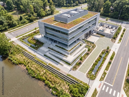 Aerial view of green laboratory complex on a waterfront site
