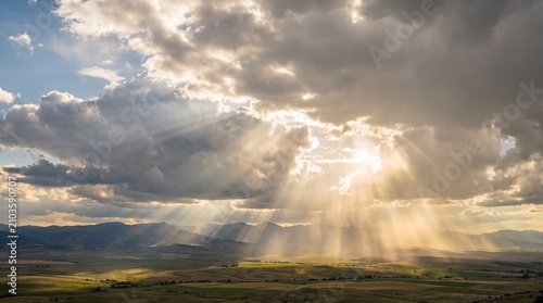 Sunbeams breaking through clouds with light rays
