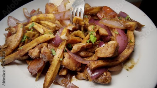 Picking up french fries from Pollo Saltado
