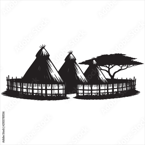 Traditional african round huts with fence and baobab tree silhouette