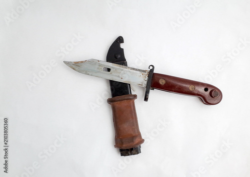 Photography Basra, Iraq - July 18, 2026: Vintage military bayonet combat knife with its matc