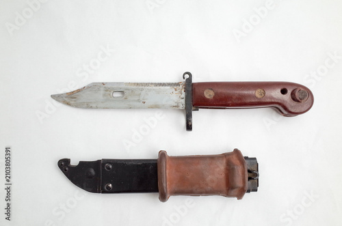 Photography Basra, Iraq - July 18, 2026: Vintage military bayonet combat knife with its matc