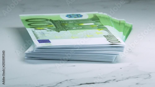 Rotating Stack of 100 Euro Banknotes 360 Degree Turntable Close Up European Currency Wealth Finance Concept 4K