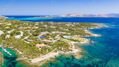 Принти на полотні Aerial view of the Stintino coastline with crystal-clear turquoise waters and th