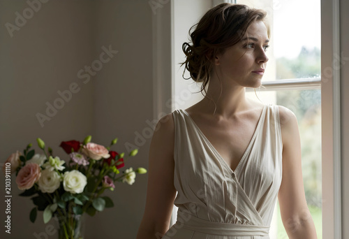 Young woman in a light dres...