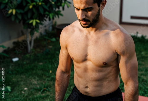 Muscular man with a beard a...