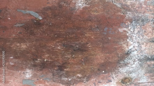 Peeling Paint Texture Background of an aged red wooden board with chipped paint and worn details, ideal for vintage-inspired designs, posters, packaging, and creative backgrounds