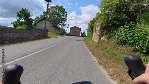 Gravel bicycle ride on the road in the summer season