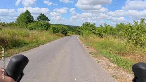Gravel bicycle ride on the road in the summer season