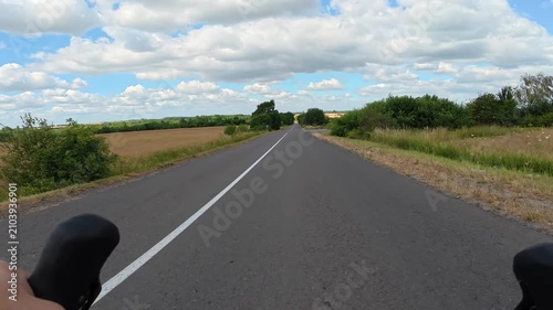 Gravel bicycle ride on the road in the summer season