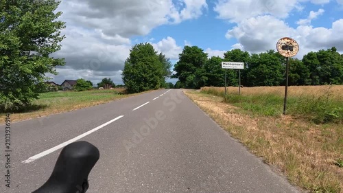 Gravel bicycle ride on the road in the summer season